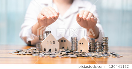 Insurance provides protection and safety for your investment in property, especially when financing a mortgage loan for your estate. insurance, protection, finance, property, investment, safe, safety 126441122