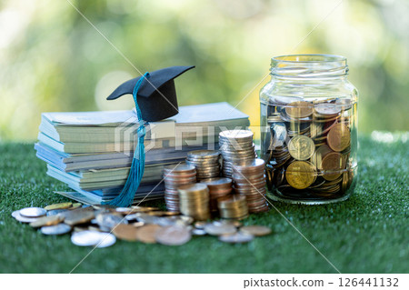 Saving for education is wise financial investment, with college funds and banking strategies helping to ensure financial growth by time of graduation. save, education, coin, banking, college, finance Saving for education is wise financial investment, with college funds and banking strategies helping to ensure financial growth by time of graduation. save, education, coin, banking, college, finance 126441132
