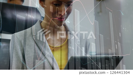 Image of data processing and diagrams over caucasian businesswoman using tablet 126441304