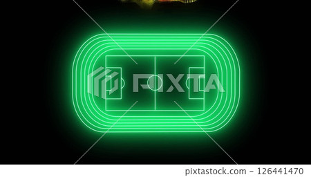 Image of yellow and red particle wave over green neon football stadium on black background 126441470