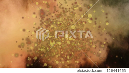 Image of glowing light spots moving over yellow background Image of glowing light spots moving over yellow background 126441663