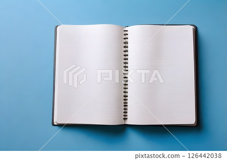 An open book on a blue background 126442038
