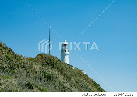 Omaezaki Lighthouse shining against the blue sky 126442132