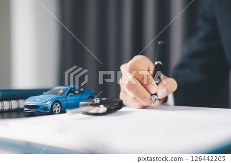 Concept business vehicle finance protection office plan investment buy sell car ensuring idea financial security. automobile agent hand protect purchase insurance and secure favorable loan deal. 126442205