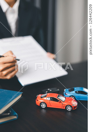 Concept business vehicle finance protection office plan investment buy sell car ensuring idea financial security. automobile agent hand protect purchase insurance and secure favorable loan deal. 126442209