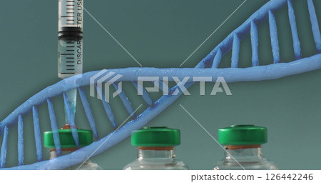 Image of dna strand over syringe on blue background 126442246