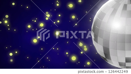 Image of yellow spots over disco ball Image of yellow spots over disco ball 126442249