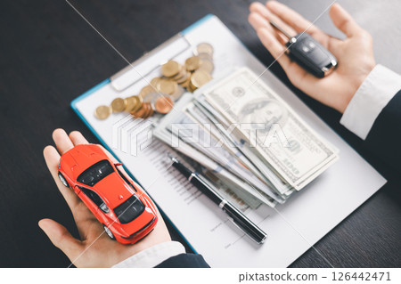 Concept business vehicle finance protection office plan investment buy sell car ensuring idea financial security. automobile agent hand protect purchase insurance and secure favorable loan deal. Concept business vehicle finance protection office plan investment buy sell car ensuring idea financial security. automobile agent hand protect purchase insurance and secure favorable loan deal. 126442471