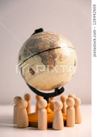 Embracing diversity and inclusion, the global community joins hands in oneness, fostering connection, cooperation, harmony, peace, and support across the earth. diversity, inclusion, globe, earth. 126442609