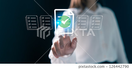 Business manager implemented document management concept using online technology, transforming office into seamless cyberspace connected by computers. document management, business technology. 126442790