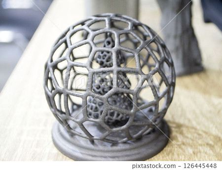 Art object printed on a 3D printer from molten plastic powder. Model printed on 3D printer from melted polyamide powder. New additive 3D printing Multi Jet Fusion MJF technology Art object printed on a 3D printer from molten plastic powder. Model printed on 3D printer from melted polyamide powder. New additive 3D printing Multi Jet Fusion MJF technology 126445448