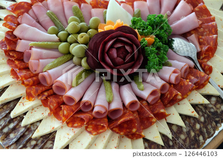 Classic Croatian starter plate with Fine Croatian ham, sliced salami and cheese 126446103