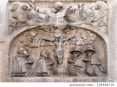 Crucifix, bass relief on the facade of Cathedral of Saint John The Baptist, Slomsek square, Maribor, Slovenia 126446116