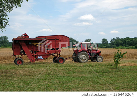 Old Threshing Machine in Trnovec, Croatia Old Threshing Machine in Trnovec, Croatia 126446264