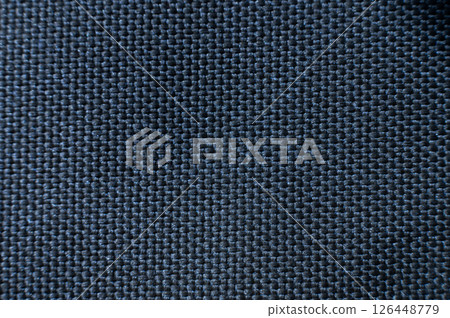 Close-up texture of textile surface. Extreme macro close-up of synthetic fabric surface 126448779