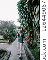 photographer taking photo with camera 126449067