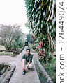 asian woman sitting on the bench 126449074