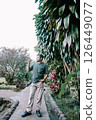 elder woman resting in garden 126449077