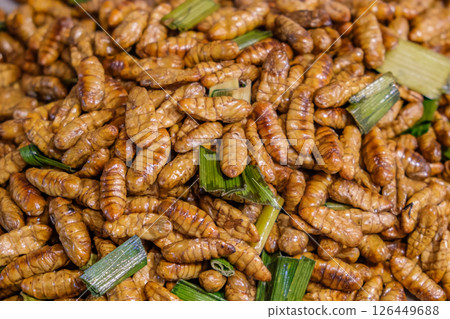 fried insect larvae, asian exotic street food, selective focus 126449688