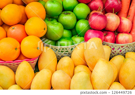 fruits and vegetables, mangoes, oranges, apples at the grocery market fruits and vegetables, mangoes, oranges, apples at the grocery market 126449726
