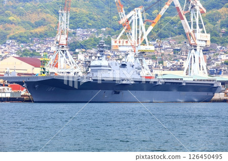 [Hiroshima Prefecture] Large escort ship Kaga anchored at the Japan Maritime Self-Defense Force Kure Base on a clear day 126450495