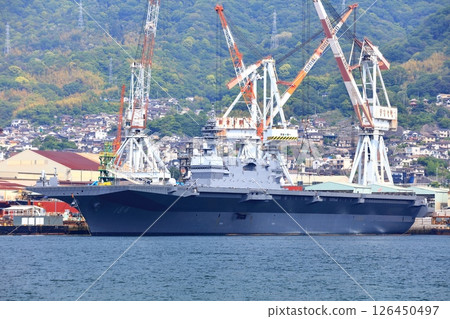 [Hiroshima Prefecture] Large escort ship Kaga anchored at the Japan Maritime Self-Defense Force Kure Base on a clear day 126450497