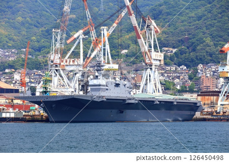 [Hiroshima Prefecture] Large escort ship Kaga anchored at the Japan Maritime Self-Defense Force Kure Base on a clear day 126450498