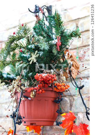 Festive Wall Decoration of a Building, Embracing the Joy and Spirit of the Holiday Season Festive Wall Decoration of a Building, Embracing the Joy and Spirit of the Holiday Season 126451236