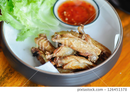 chicken wings or deep fried chicken , fried chicken and sauce 126451378