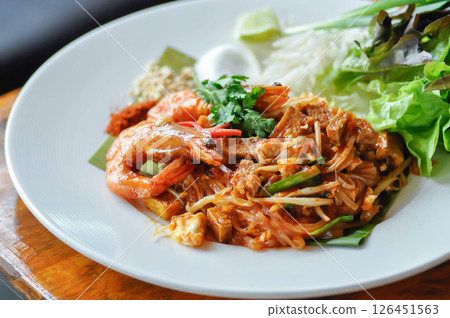 pad thai or stir fried noodle or pan fried noodles or shrimp noodles pad thai or stir fried noodle or pan fried noodles or shrimp noodles 126451563
