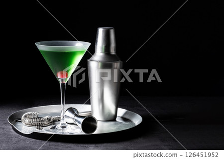 Japanese slipper cocktail on black background Japanese slipper cocktail on black background 126451952