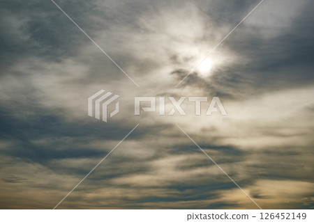 sun breaks through the storm clouds and overcast sky 126452149