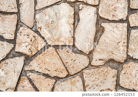 wall is lined with granite flat stones 126452153