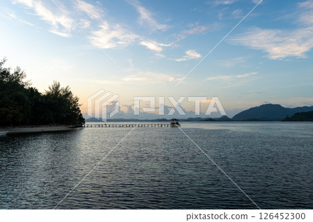 Sunset view of pier on Bolilanga Island, Togian archipelago, Sulawesi, Indonesia Sunset view of pier on Bolilanga Island, Togian archipelago, Sulawesi, Indonesia 126452300