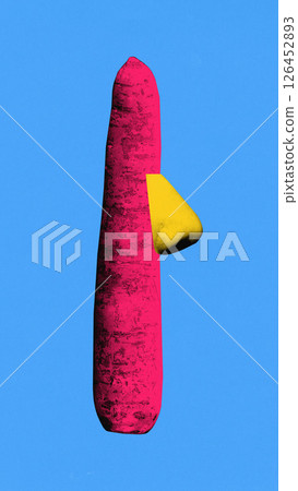 Surreal art design. Tall pink carrot stands upright with single yellow human nose against bright blue background. Pop art style. Surreal art design. Tall pink carrot stands upright with single yellow human nose against bright blue background. Pop art style. 126452893