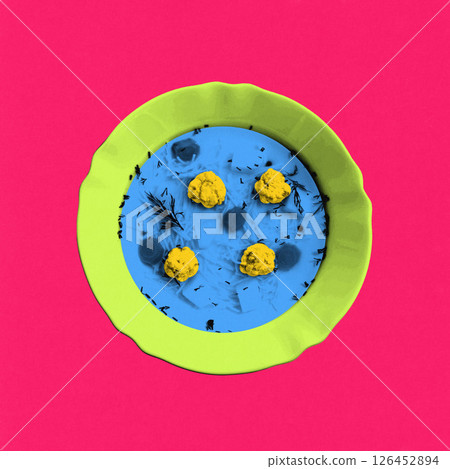 Abstract art collage. Neon green bowl of bright blue soup filled with yellow meatballs and black herbs forms culinary. Color and form. 126452894