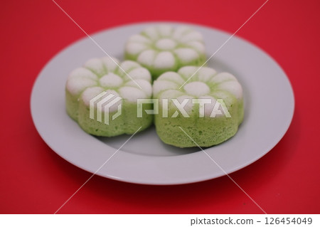 Steamed Flower Shaped Cakes on a Plate 126454049