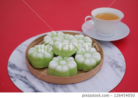 Steamed Flower Shaped Cakes on a Plate 126454050