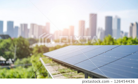 Solar panel installation rooftop with city skyline background Solar panel installation rooftop with city skyline background 126454436