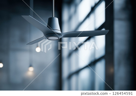 Sleek Silver Ceiling Fan in Modern Industrial Setting 126454591