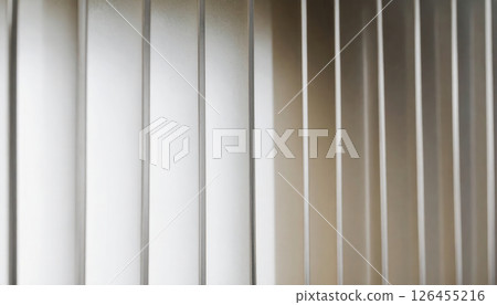Close up of vertical metal bars creating pattern modern 126455216