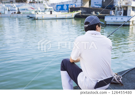 Men enjoying fishing Men enjoying fishing 126455480