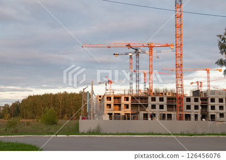 A construction crane on a blue sky background. 126456076