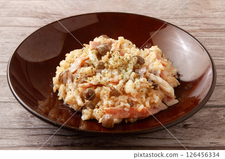 Brown rice mushroom risotto 126456334