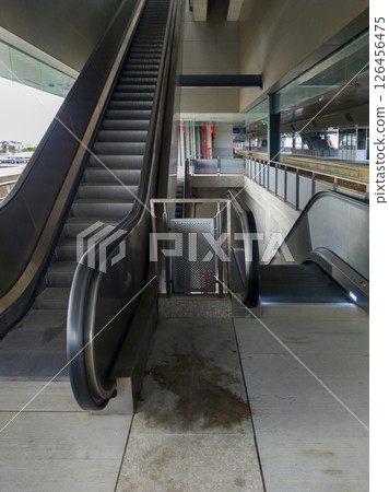 Sleek Escalator in Modern train Station. 126456475