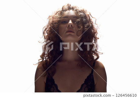 beautiful young woman with curly hair. isolated portrait beautiful young woman with curly hair. isolated portrait 126456610
