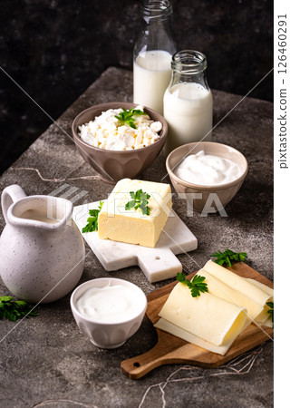 Dairy products. Milk, cottage cheese, cream, butter and yogurt 126460291