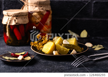 Bowl of pickled marinated cucumbers Bowl of pickled marinated cucumbers 126460293