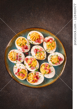 Spicy, stuffed ramen eggs, with bacon and green onions, homemade, no people, 126460477