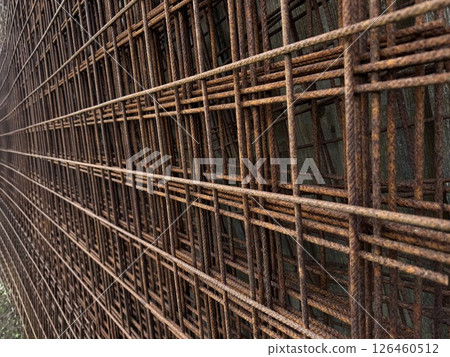 Wall made of metal bars with a lot of rust Wall made of metal bars with a lot of rust 126460512